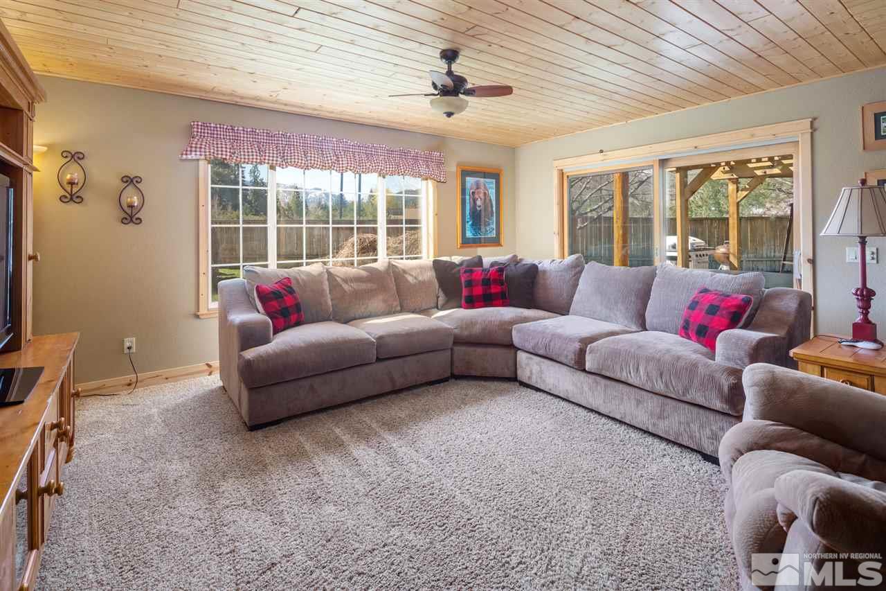 345 Prickly Pear Road Verdi, NV 89439 - Photo 14 of 26 a living room with furniture and a large window