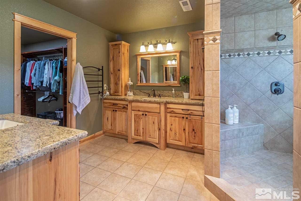345 Prickly Pear Road Verdi, NV 89439 - Photo 19 of 26 a kitchen with a sink stove and refrigerator