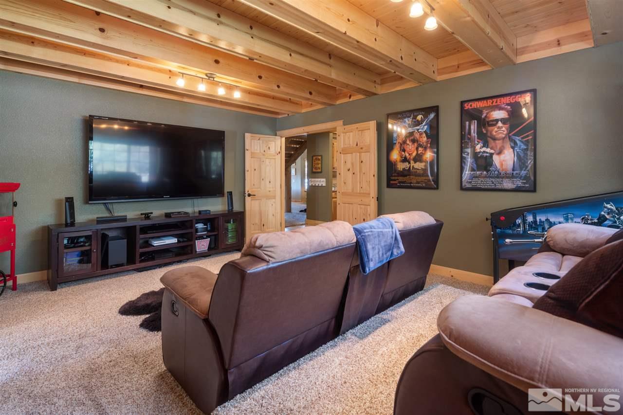 345 Prickly Pear Road Verdi, NV 89439 - Photo 22 of 26 a living room with furniture and a flat screen tv