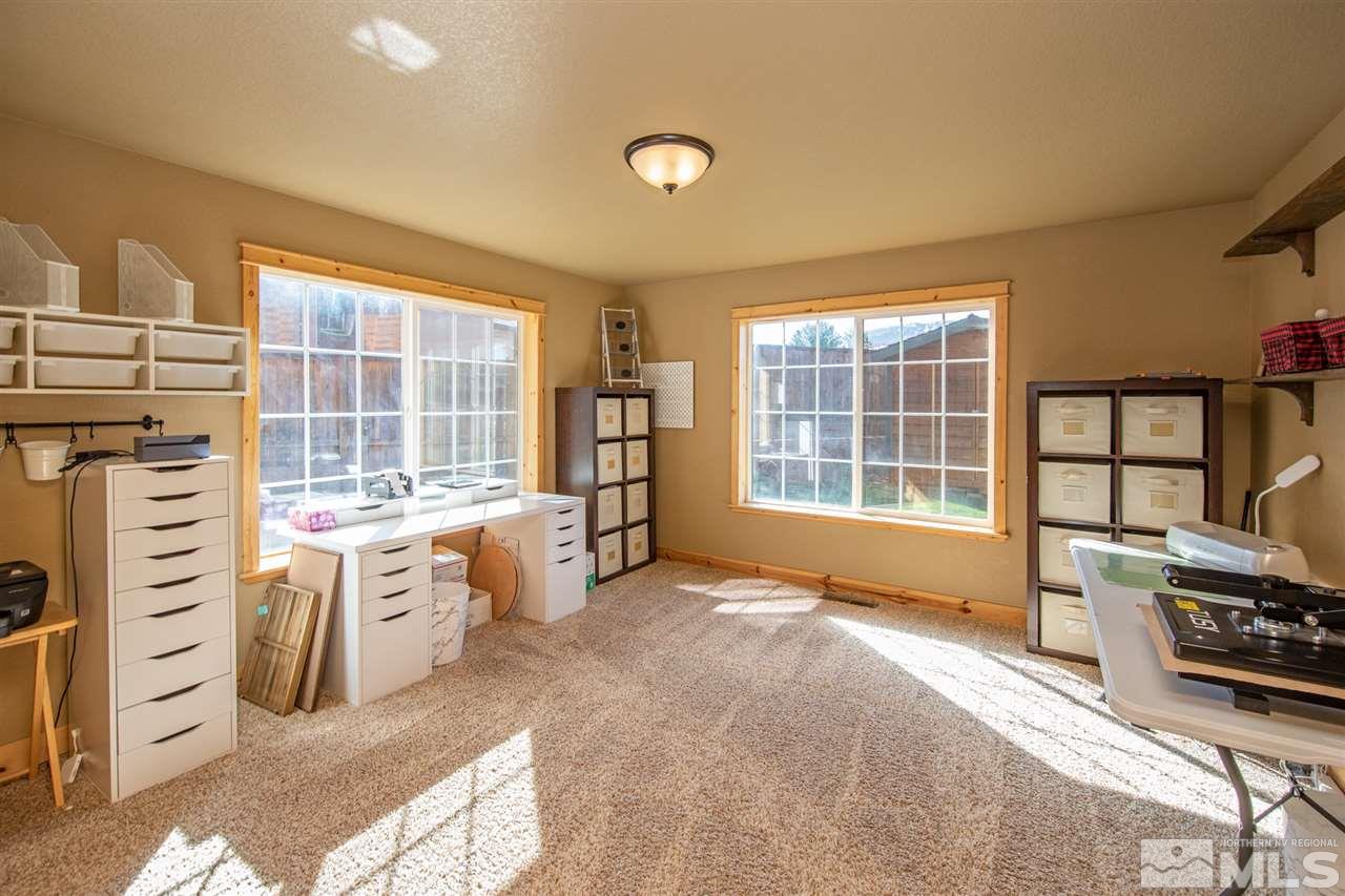 345 Prickly Pear Road Verdi, NV 89439 - Photo 23 of 26 a spacious bedroom with furniture and a large window