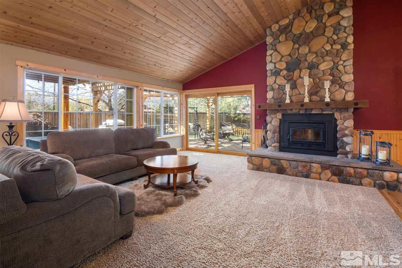 345 Prickly Pear Road Verdi, NV 89439 - Photo 4 of 26 a living room with furniture and a fireplace