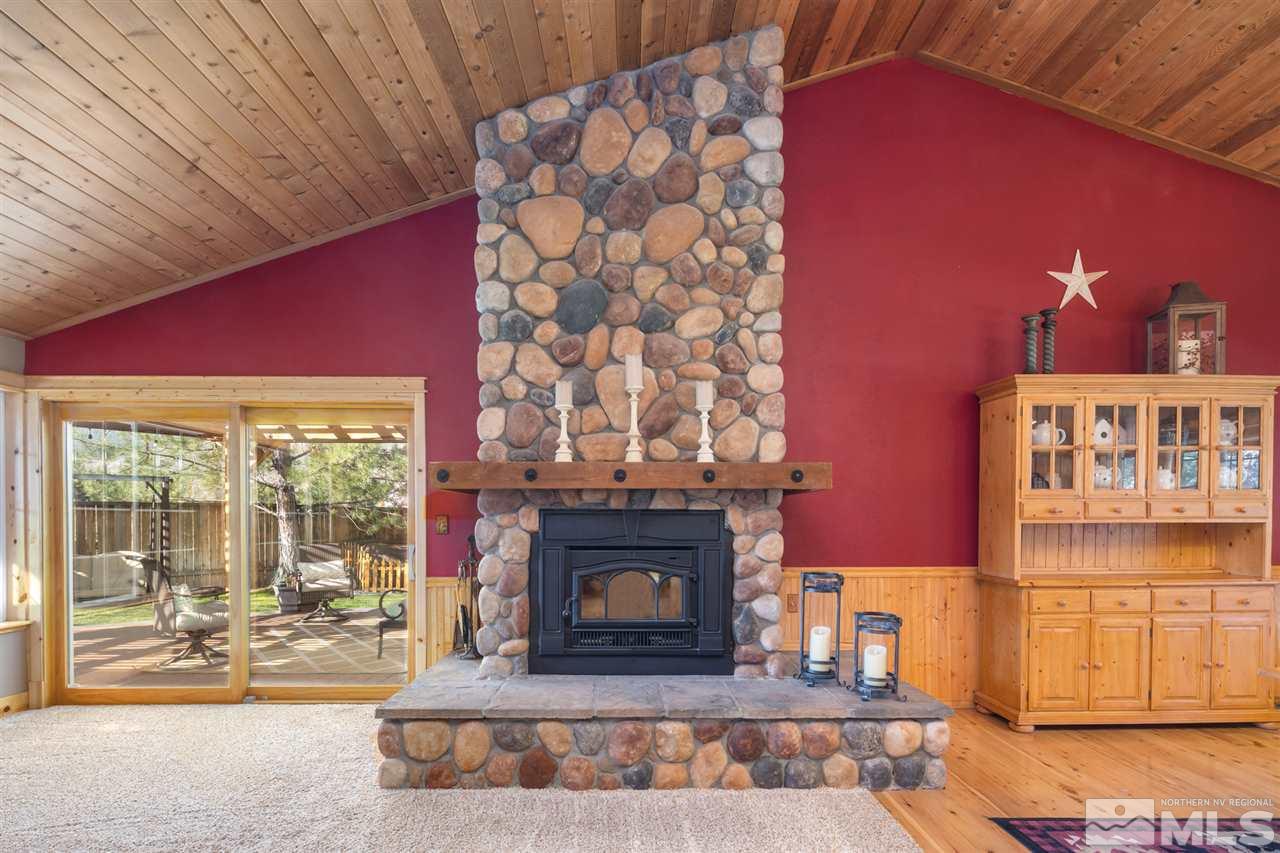 345 Prickly Pear Road Verdi, NV 89439 - Photo 10 of 26 a living room with a fireplace furniture and a fireplace