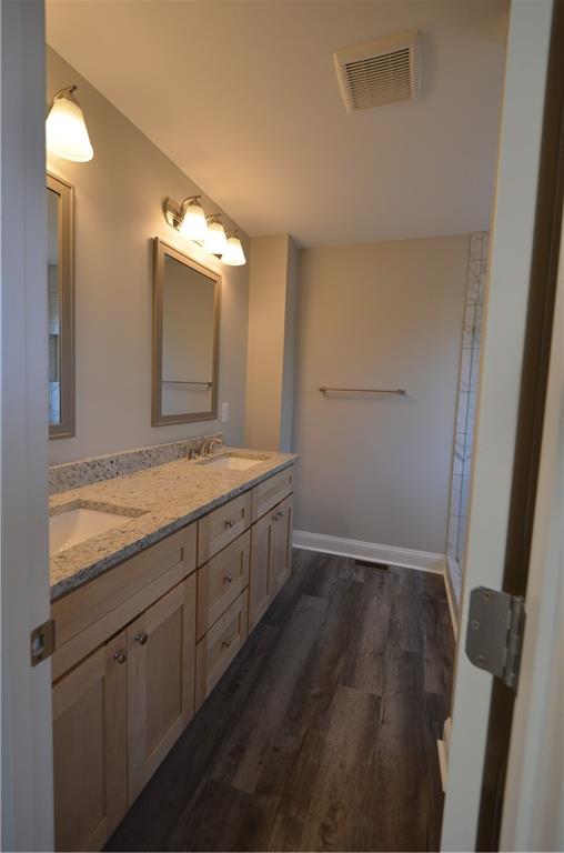 112 Jade Lane Dallas, GA 30132 - Photo 15 of 27 a bathroom with a sink and a mirror