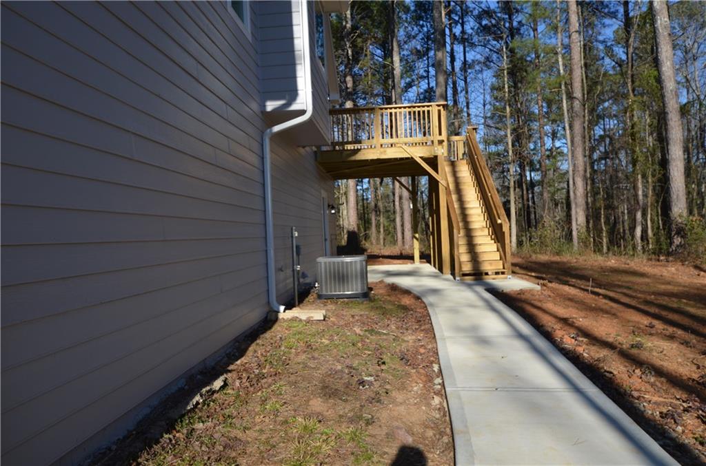 112 Jade Lane Dallas, GA 30132 - Photo 27 of 27 a view of a house with basketball court