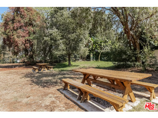 281 South Barrington Avenue, Unit C2 Los Angeles, CA 90049 - Photo 21 of 24 a view of a backyard with sitting area