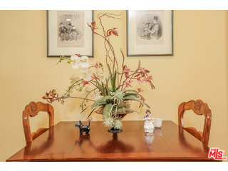 281 South Barrington Avenue, Unit C2 Los Angeles, CA 90049 - Photo 7 of 24 a picture of a room with wall paintings