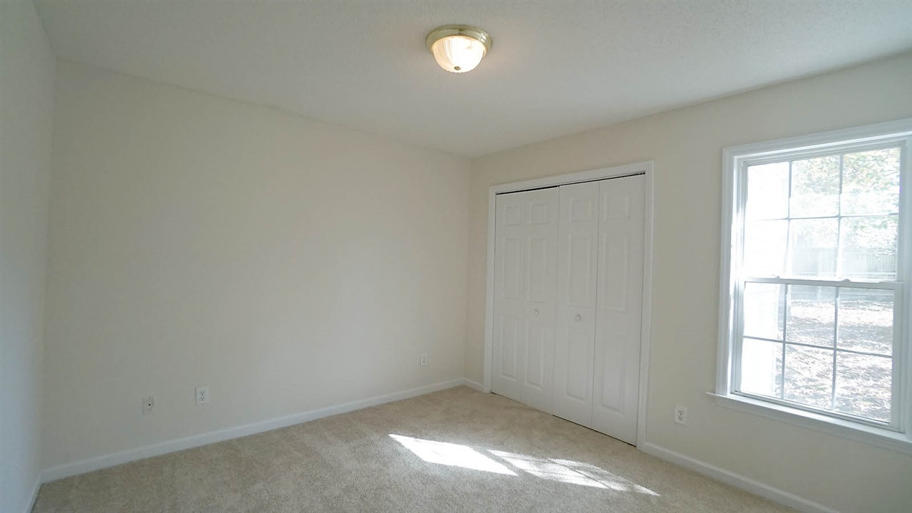 701 Kavkaz Street Raleigh, NC 27610 - Photo 19 of 25 Large Guest Bedroom