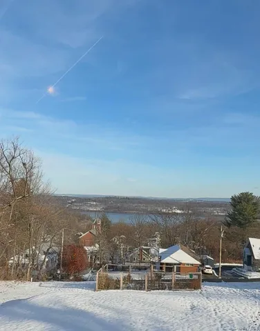 a view of lake with mountain