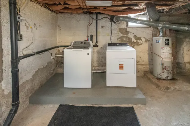 a utility room with a washer and dryer