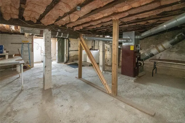 a view of an empty room with gym equipment