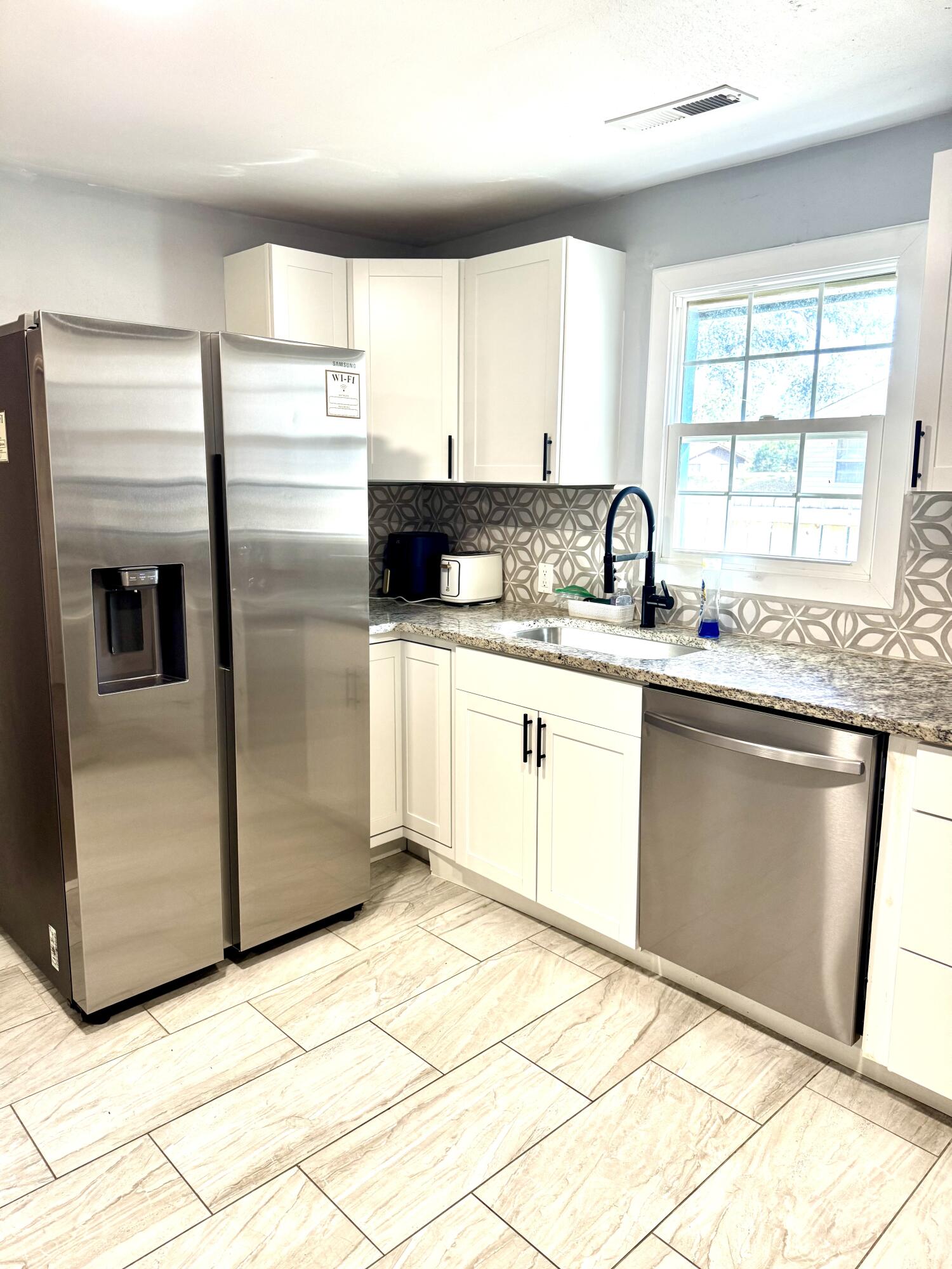 4319 Davison Road Ravenel, SC 29470 - Photo 23 of 31 4319 kitchen fridge