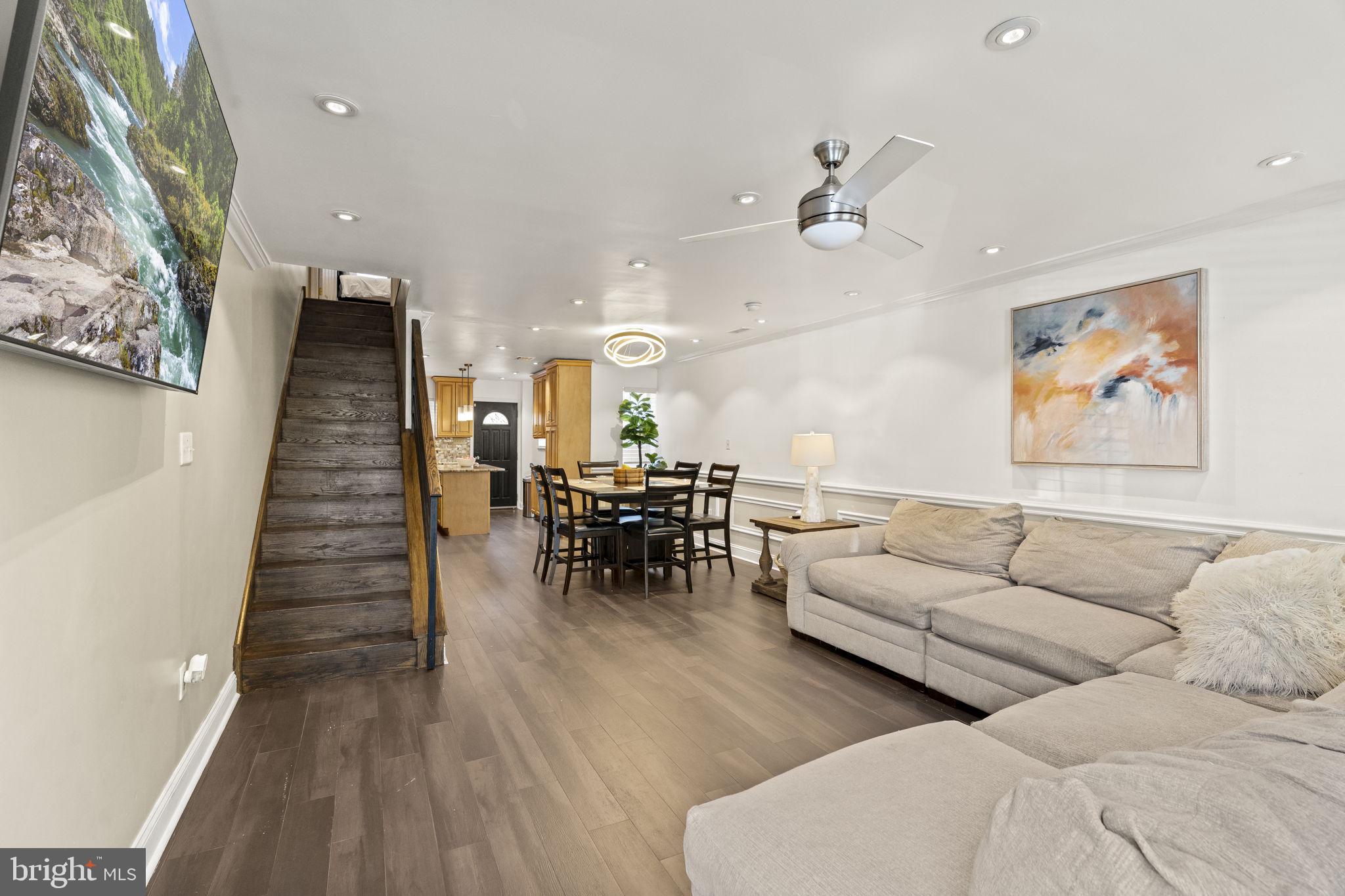 2006 Ellsworth Street Philadelphia, PA 19146 - Photo 2 of 34 a living room with furniture and wooden floor