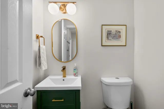 a living room with furniture a rug and a window