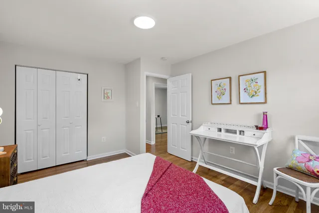 a room with furniture and musical instruments