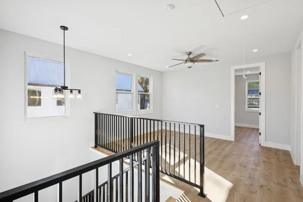 a view of a hallway with workspace