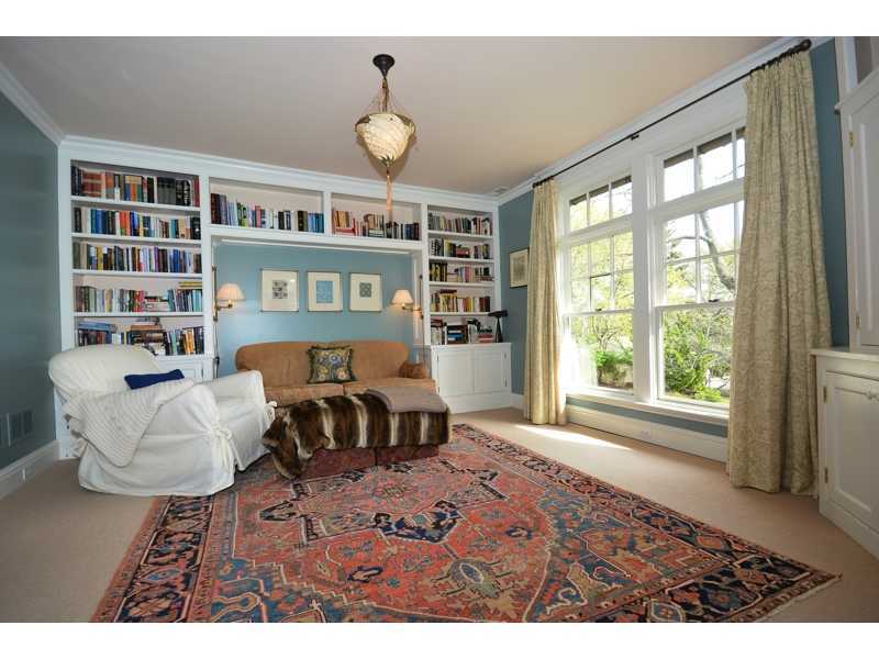 22 Searles Road Darien, CT 06820 - Photo 13 of 25 a living room with furniture and a large window