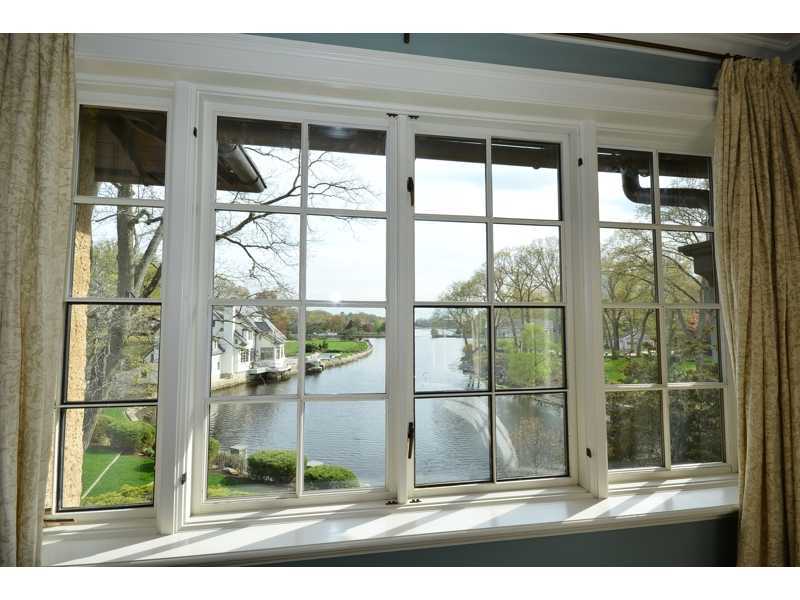 22 Searles Road Darien, CT 06820 - Photo 14 of 25 a view of a glass door and the porch