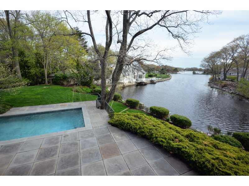22 Searles Road Darien, CT 06820 - Photo 2 of 25 a view of a backyard of the house