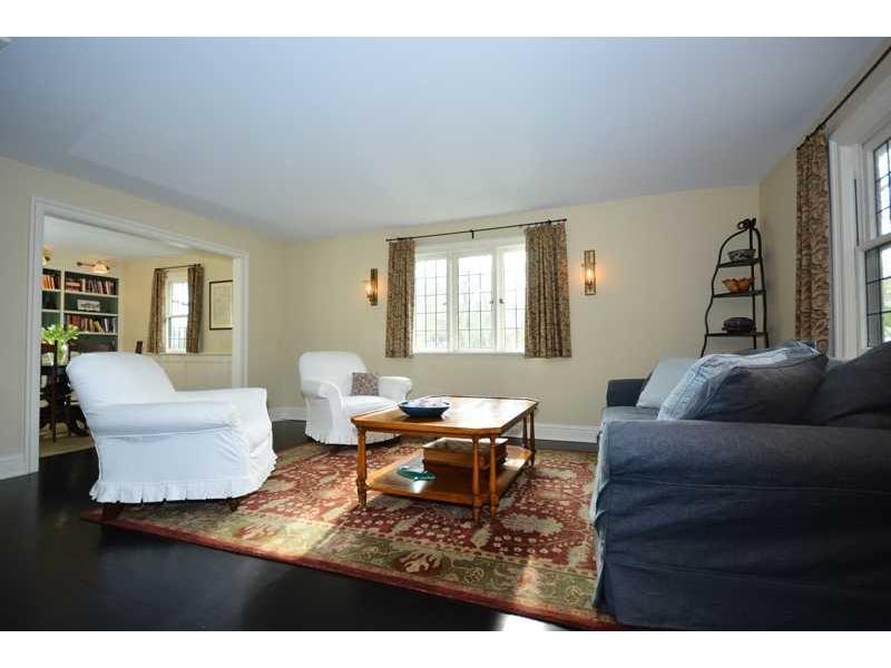 22 Searles Road Darien, CT 06820 - Photo 23 of 25 a living room with furniture and wooden floor