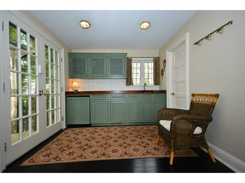 22 Searles Road Darien, CT 06820 - Photo 25 of 25 a living room with furniture and a large window