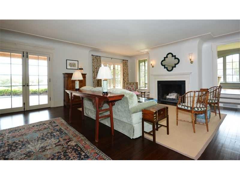 22 Searles Road Darien, CT 06820 - Photo 8 of 25 a living room with furniture and a fireplace