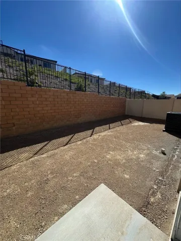 a view of swimming pool with a yard