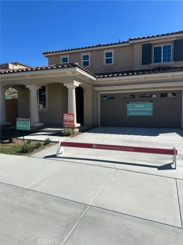a view of a kitchen with a stove and a microwave