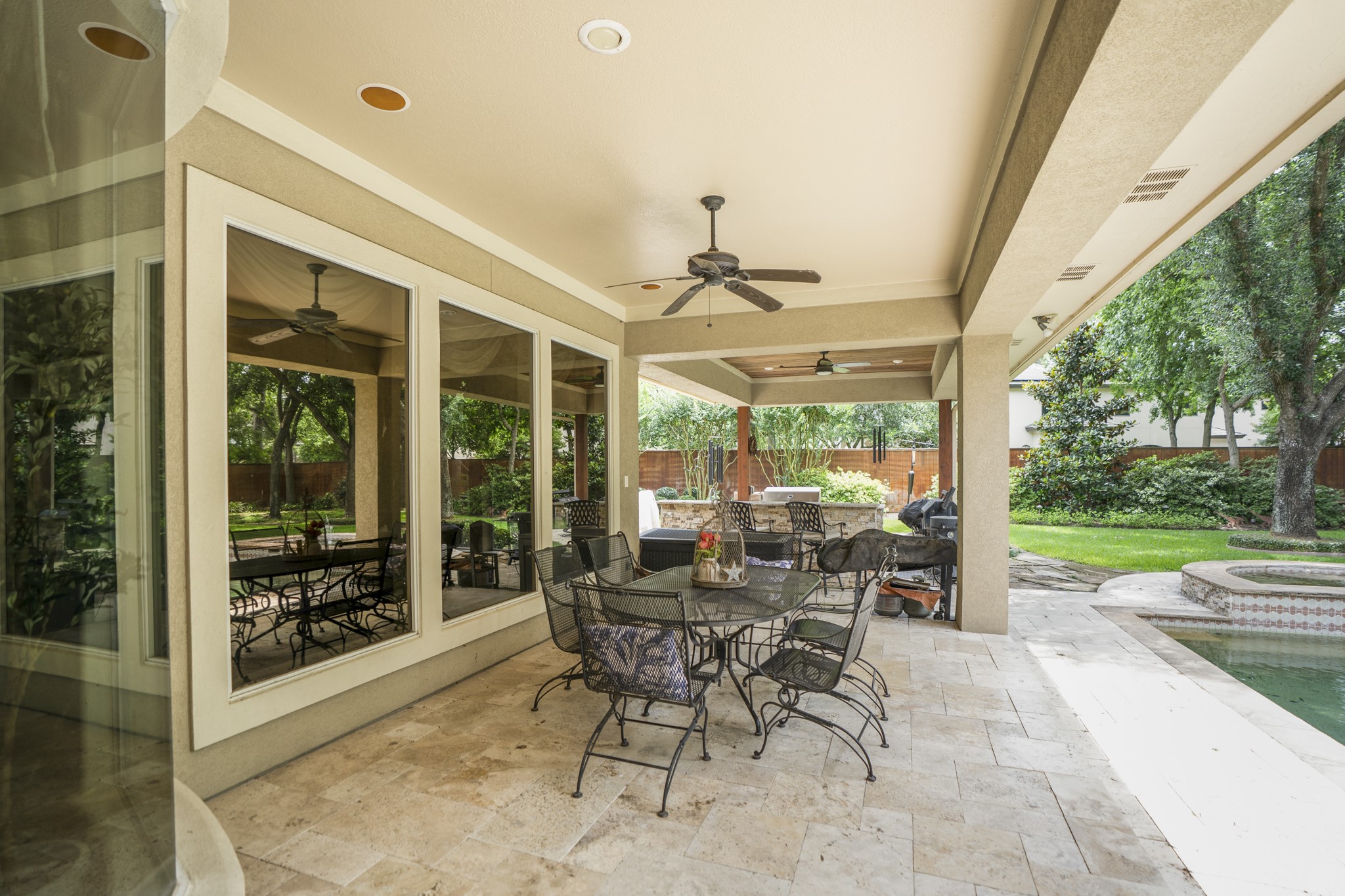 8806 Sterling Gate Circle Spring, TX 77379 - Photo 36 of 40 This covered patio is located just outside the breakfast area and den. This is just one of the covered patios on the first floor.
