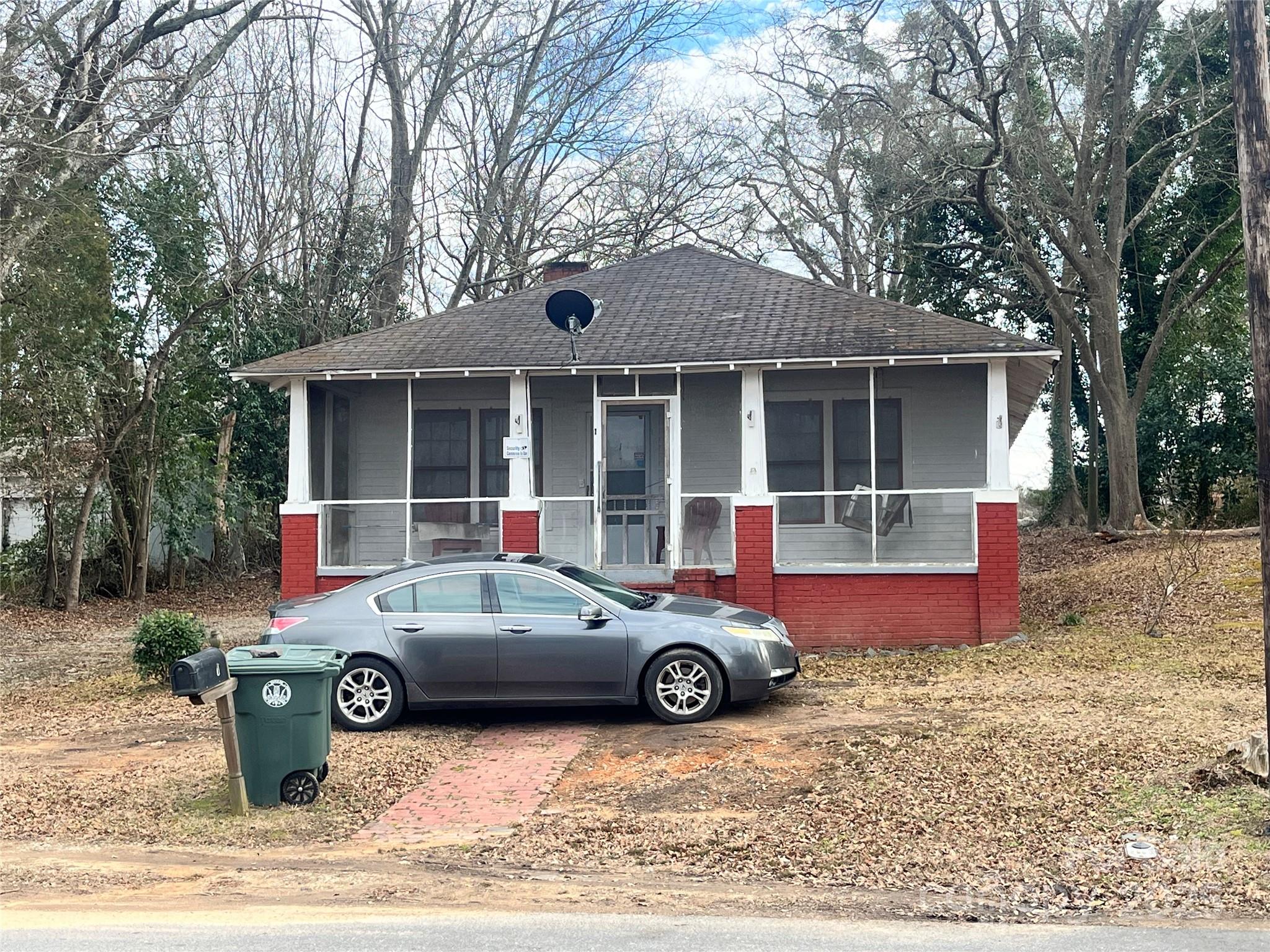 1 Catawba Avenue Great Falls, SC 29055 - Photo 1 of 4 a car parked in front of a house