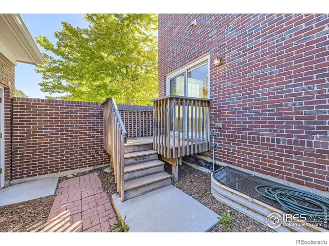 a view of a wooden roof deck