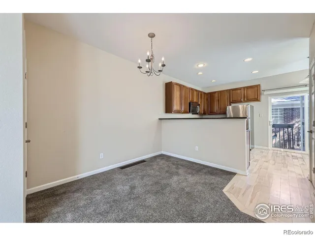 a view of a kitchen with a sink