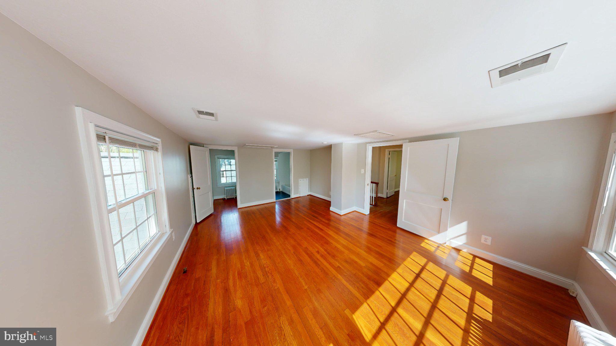 7309 River Road Bethesda, MD 20817 - Photo 11 of 34 Spacious room with warm sunlight glow.