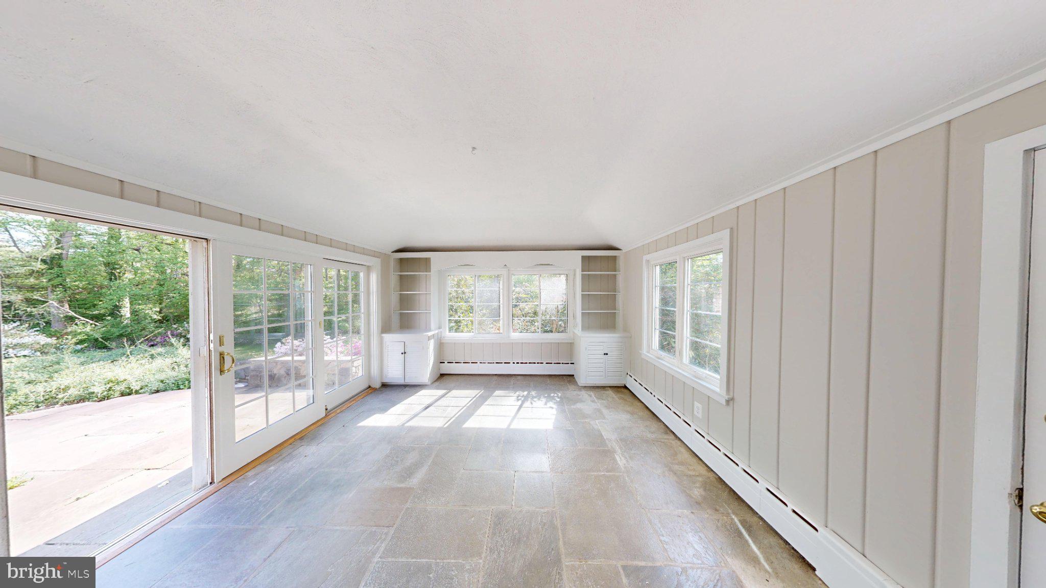 7309 River Road Bethesda, MD 20817 - Photo 12 of 34 Bright and airy sunroom retreat.