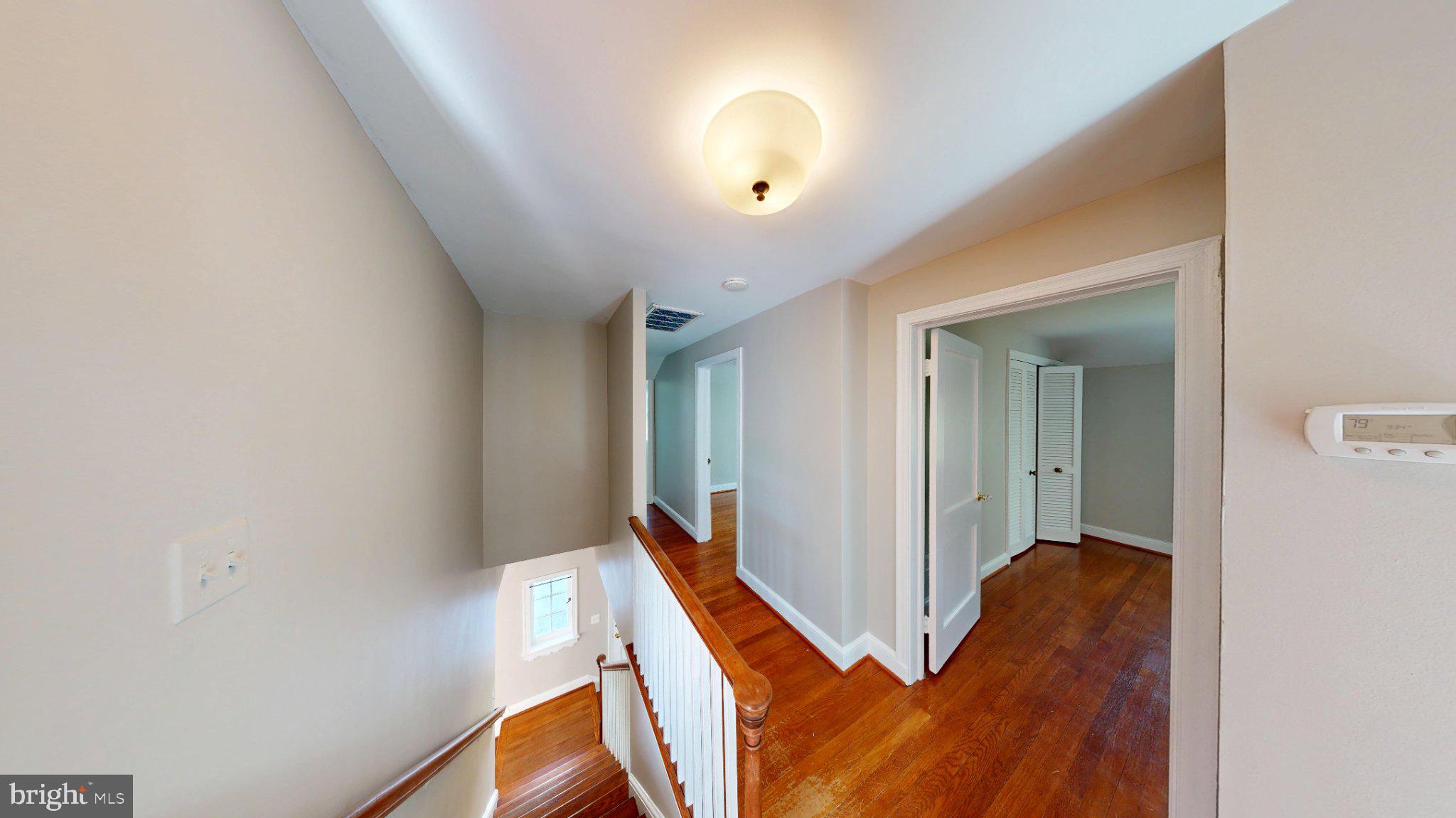 7309 River Road Bethesda, MD 20817 - Photo 14 of 34 Bright and inviting upper hallway.