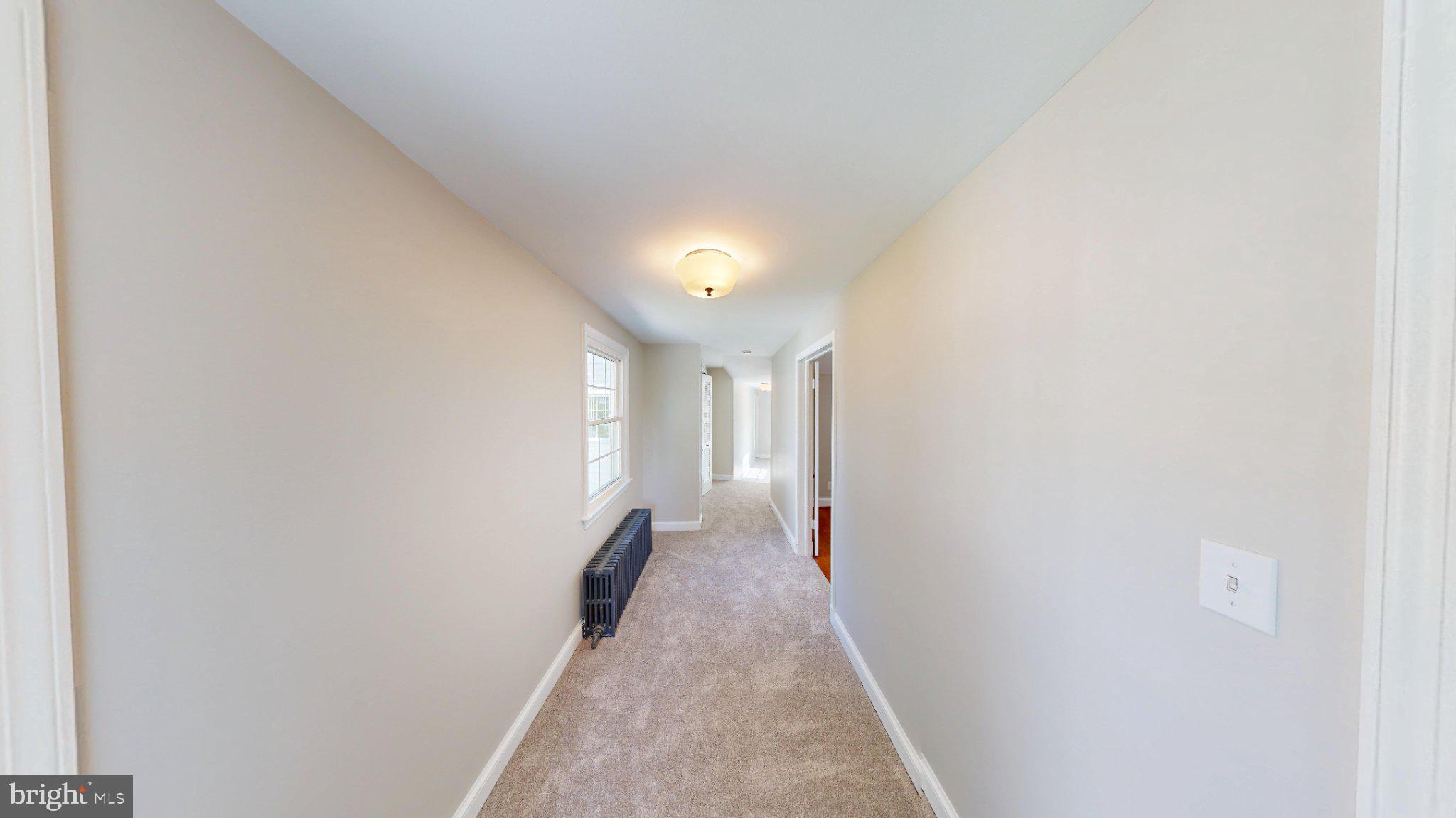7309 River Road Bethesda, MD 20817 - Photo 22 of 34 Bright and inviting hallway awaits you.
