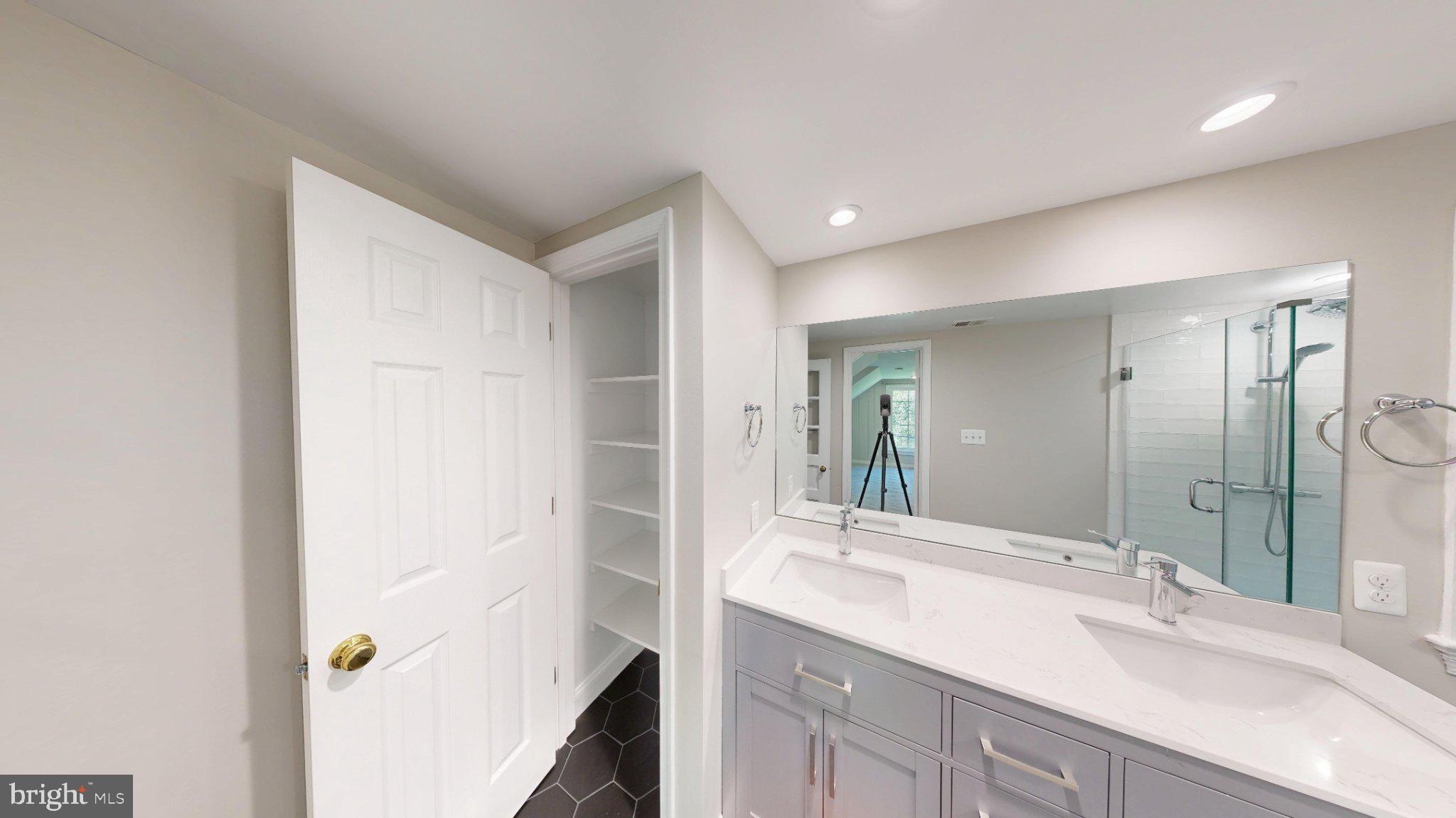 7309 River Road Bethesda, MD 20817 - Photo 25 of 34 Sleek bathroom with modern finishes.
