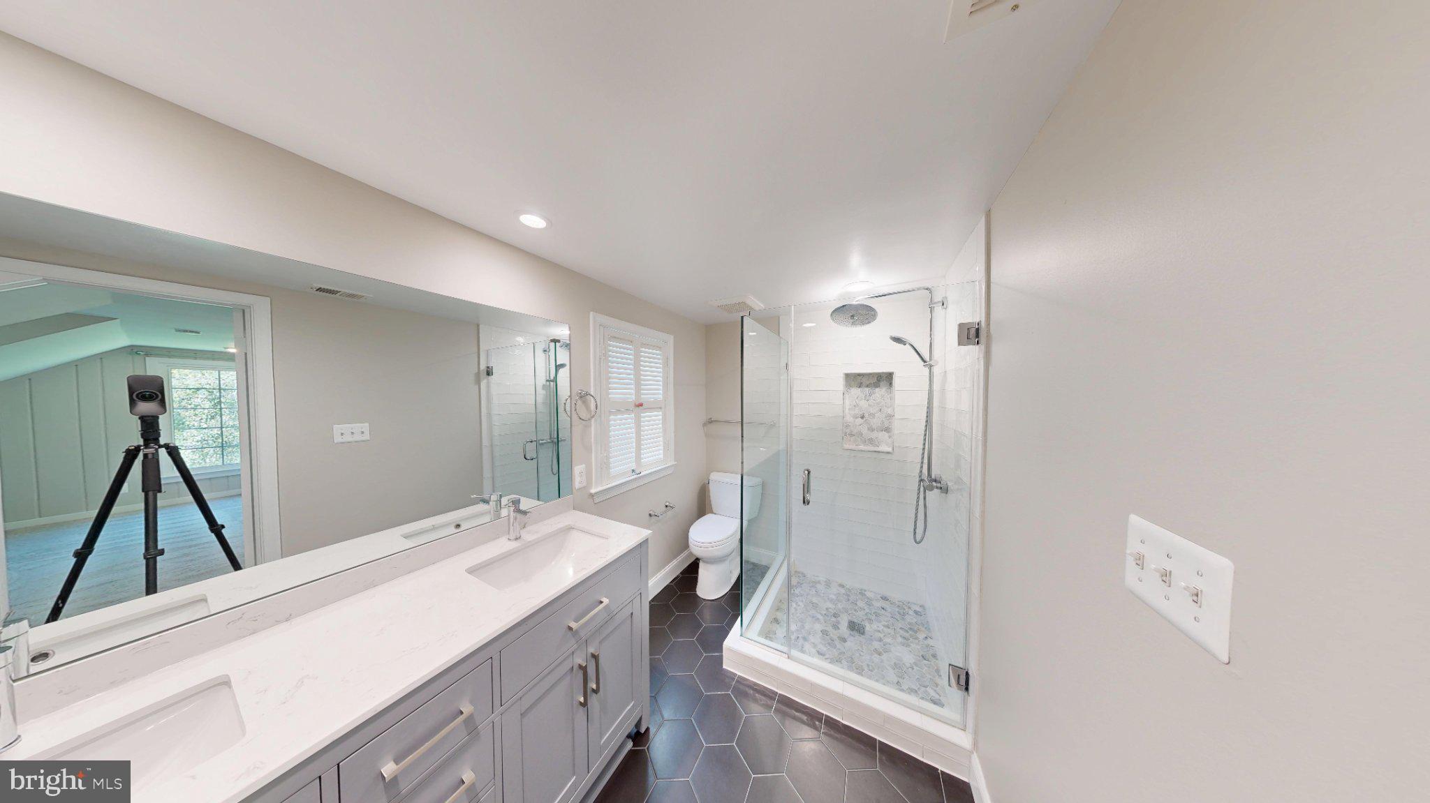 7309 River Road Bethesda, MD 20817 - Photo 26 of 34 Modern bathroom with sleek design.