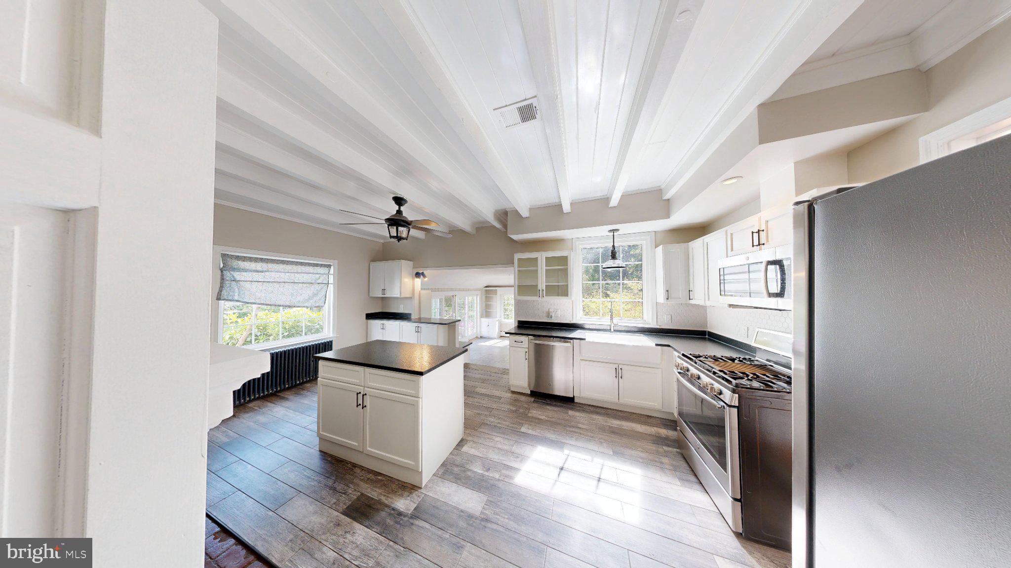 7309 River Road Bethesda, MD 20817 - Photo 3 of 34 Bright, airy kitchen with rustic charm.