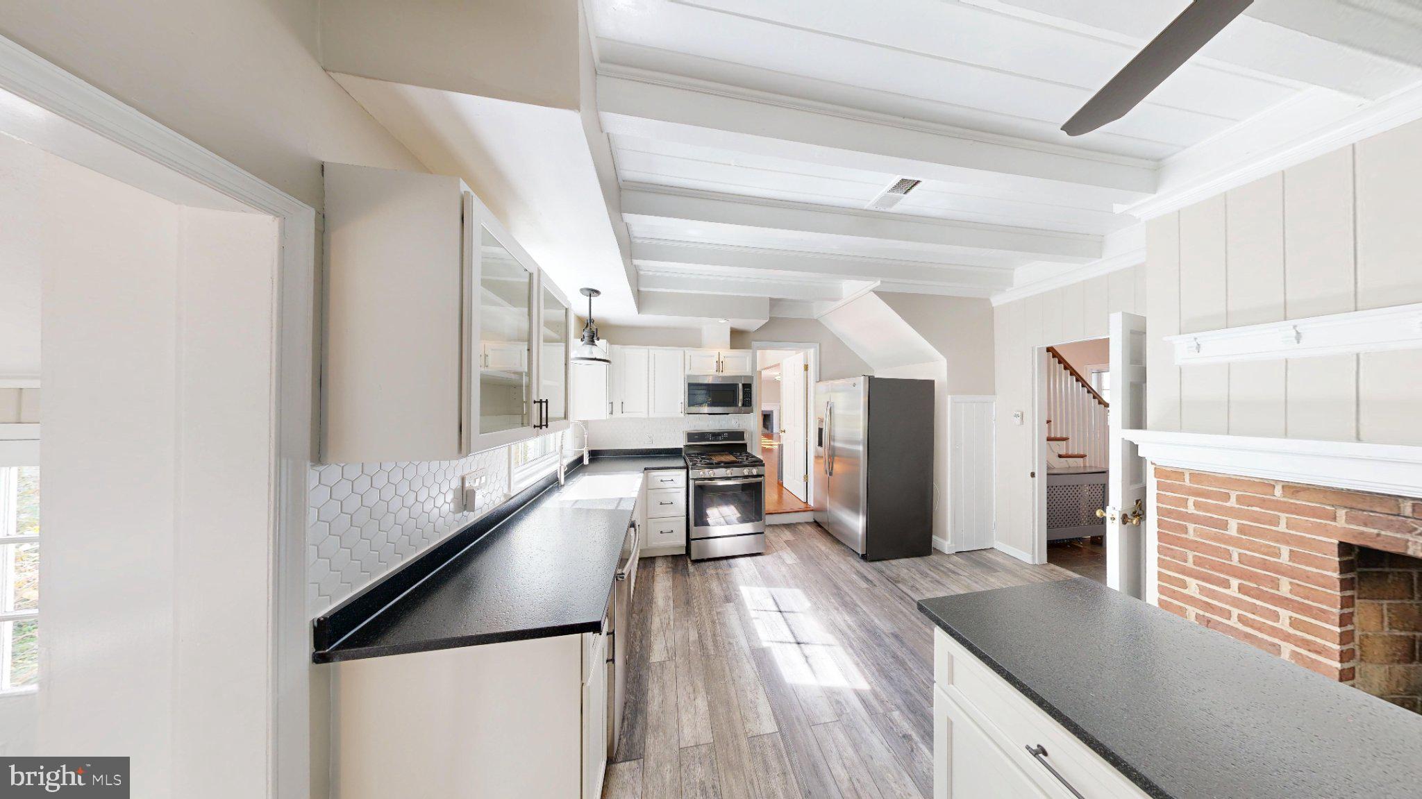 7309 River Road Bethesda, MD 20817 - Photo 4 of 34 Bright and airy kitchen with charm.