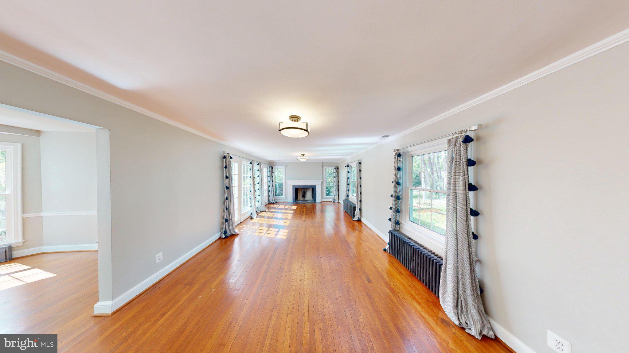 7309 River Road Bethesda, MD 20817 - Photo 7 of 34 Spacious, sunlit living area awaits.