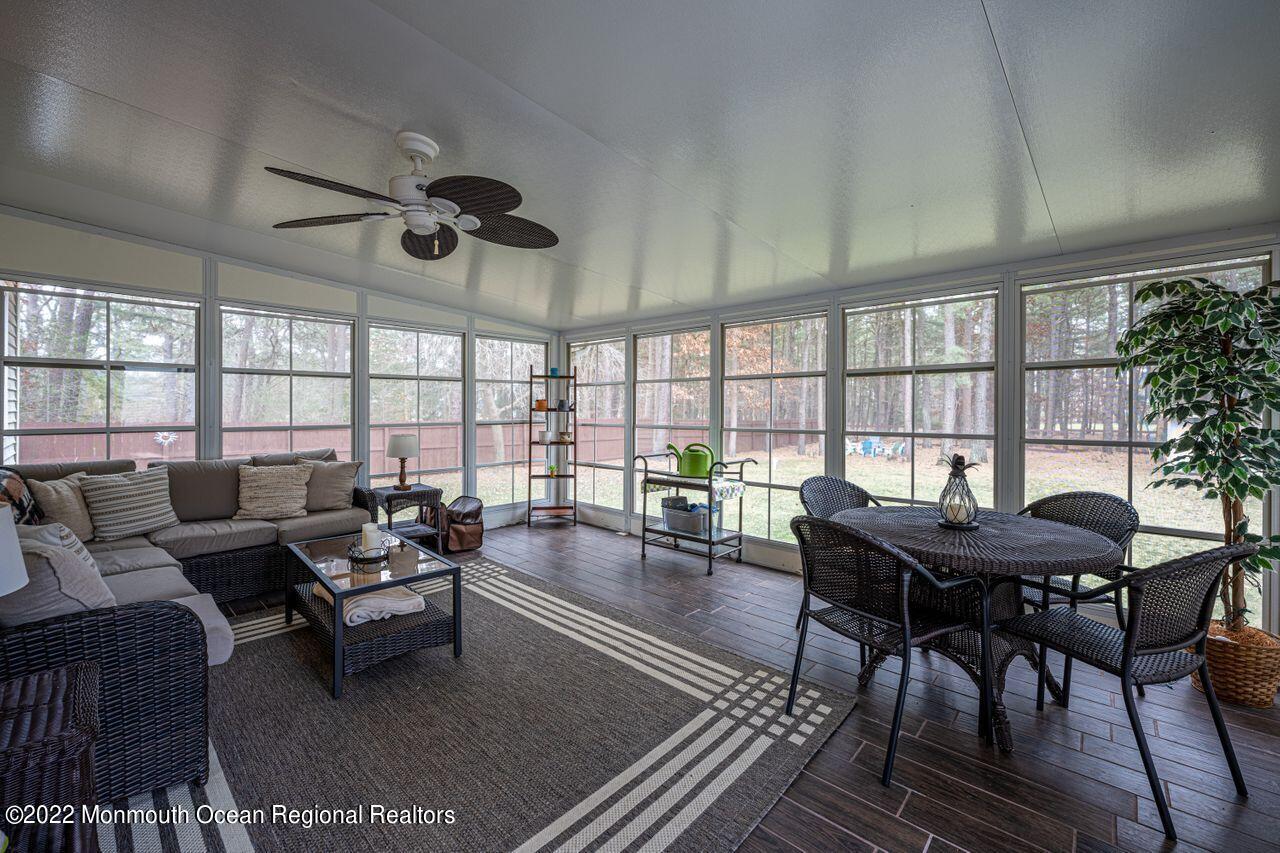 621 Reed Road Jackson, NJ 08527 - Photo 17 of 35 a living room with furniture and a large window