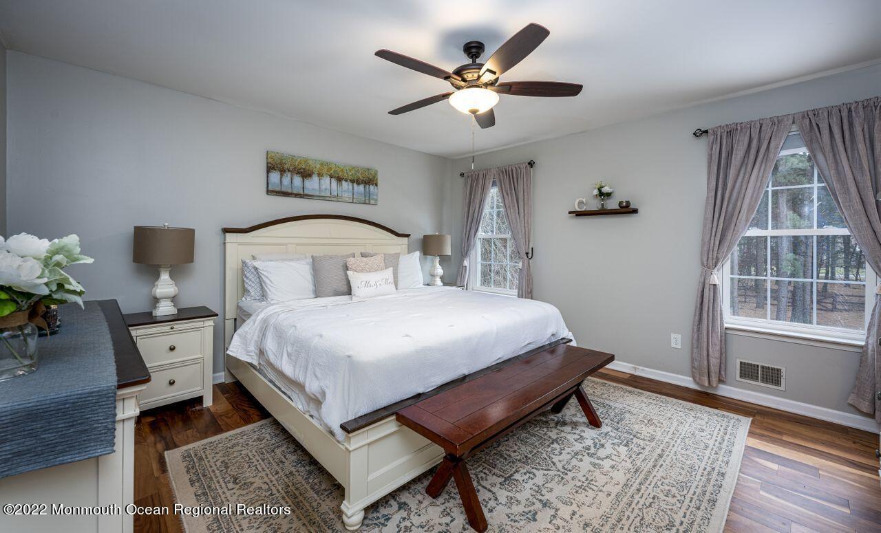 621 Reed Road Jackson, NJ 08527 - Photo 20 of 35 a bedroom with a bed and a window