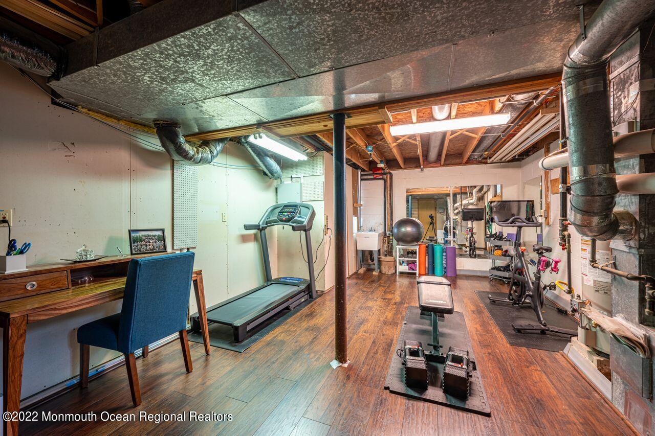 621 Reed Road Jackson, NJ 08527 - Photo 30 of 35 a outdoor space with lots of furniture and wooden floors