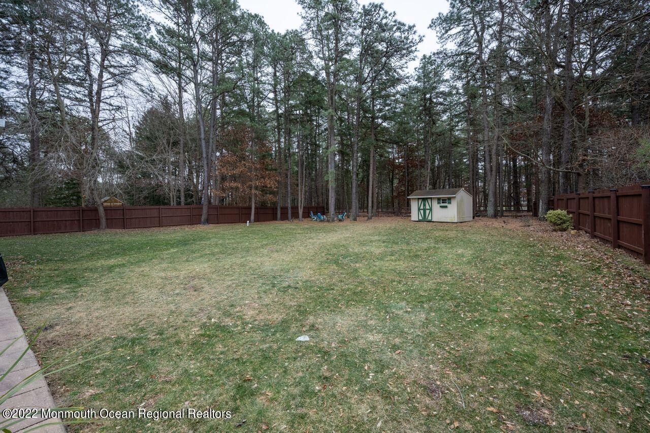621 Reed Road Jackson, NJ 08527 - Photo 35 of 35 a house with trees in front of it