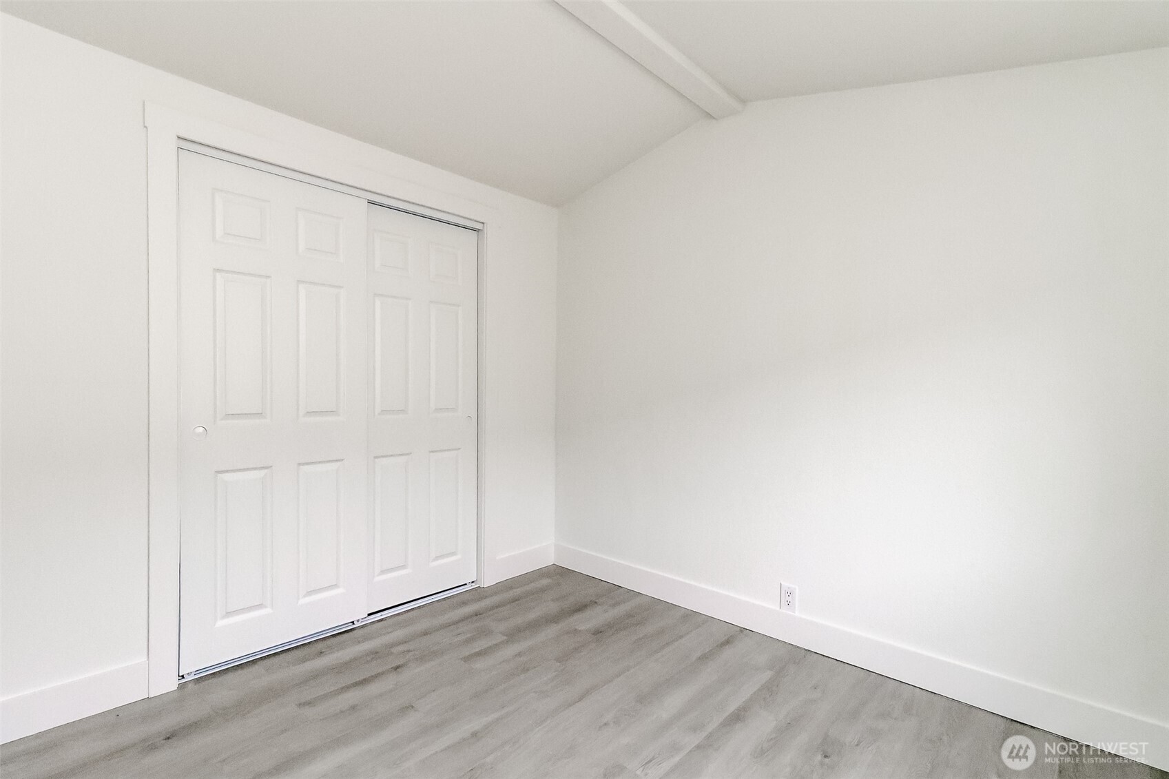 210 37th Street Southeast, Unit 35 Auburn, WA 98002 - Photo 18 of 39 an empty room with wooden floor