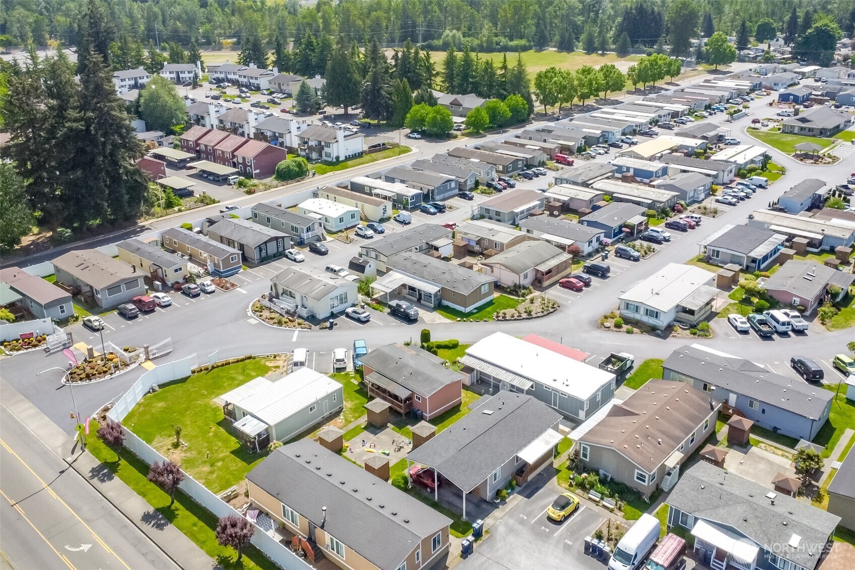 210 37th Street Southeast, Unit 35 Auburn, WA 98002 - Photo 39 of 39 an aerial view of a house with a swimming pool