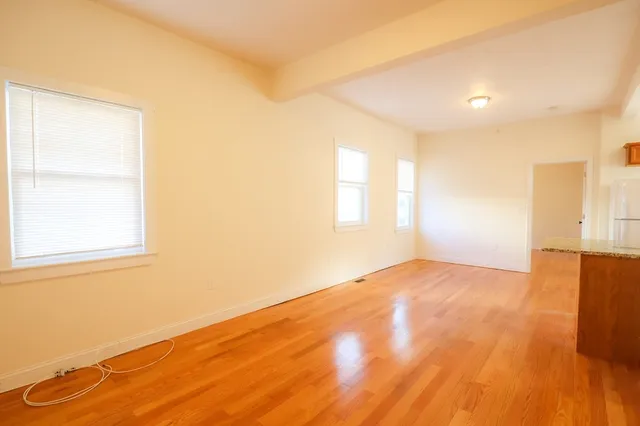 a view of an empty room and window