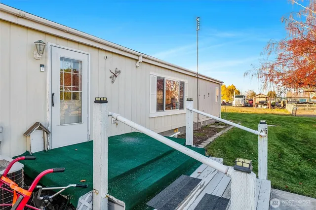 a view of a street with wooden floor