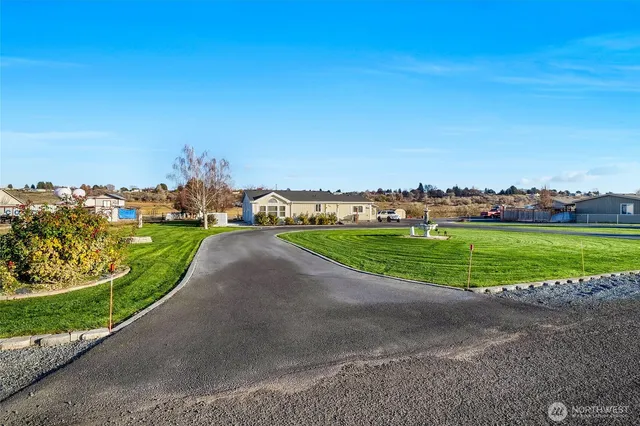 a view of a golf course with a park