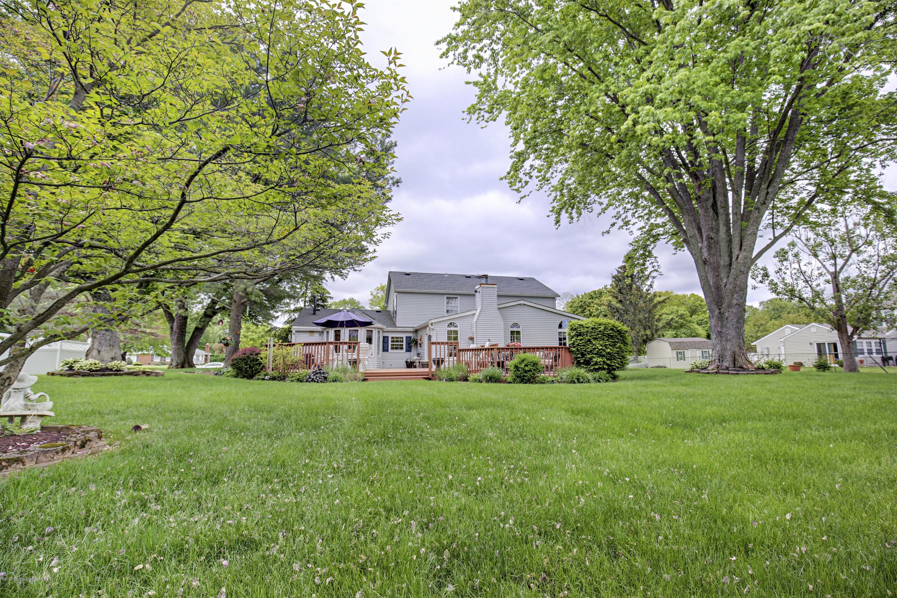 11 Applegate Road Freehold, NJ 07728 - Photo 23 of 23 a front view of a house with garden